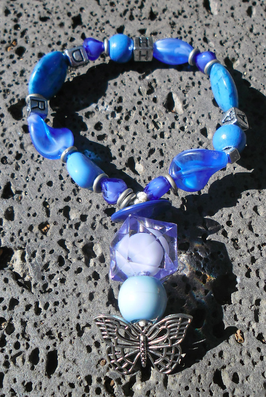 Bracelet bleu au papillon d'argent cdemontardy